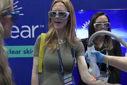 Young woman in conversation during skin treatment