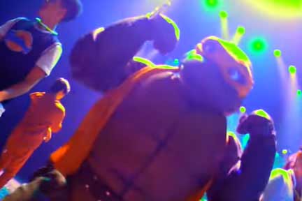 Ninja turtle dancing on stage